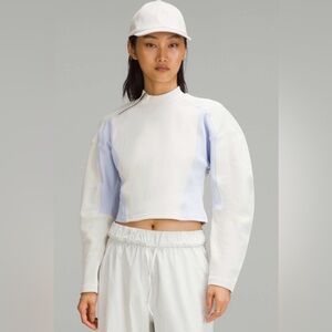 Lululemon Ribbed Luxtreme Wide-Sleeve
Pullover Bone / Blissful Blue! NWT new S